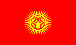 The flag of Kyrgyzstan features a yellow sun with forty rays at the center of a red field. At the center of the sun is a stylized depiction of a tunduk.