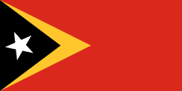 The flag of Timor-Leste has a red field with two isosceles triangles which share a common base on the hoist end. The smaller black triangle, which bears a five-pointed white star at its center and spans one-third the width of the field, is superimposed on the larger yellow triangle that extends to the center of the field.