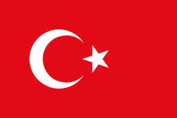 The flag of Turkey has a red field bearing a large fly-side facing white crescent and a smaller five-pointed white star placed just outside the crescent opening. The white crescent and star are offset slightly towards the hoist side of center.