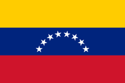 The flag of Venezuela is composed of three equal horizontal bands of yellow, blue and red. At the center of the blue band are eight five-pointed white stars arranged in a horizontal arc.